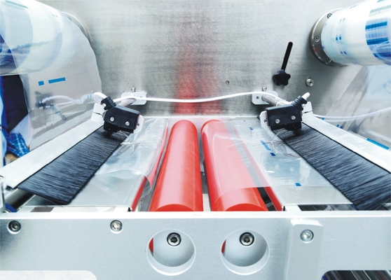 Macchina imballatrice orizzontale ricambiante automatica con il dispositivo di commutazione del film